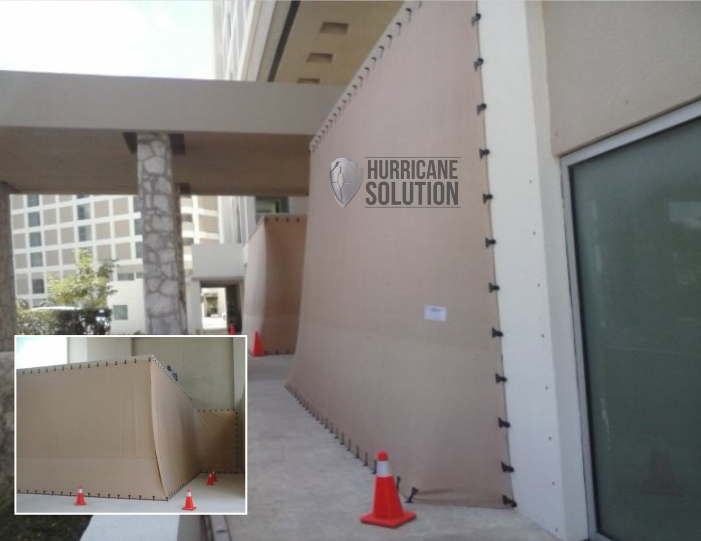 Hurricane Solution fabric screen secured around a hotel opening beside a glazed entrance.